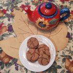 crinkly gingersnap cookies and a pot of tea